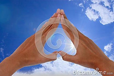 Sun sky and hand Stock Photo